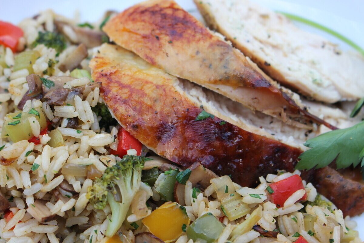 closeup view of garden vegetable rice and chicken.