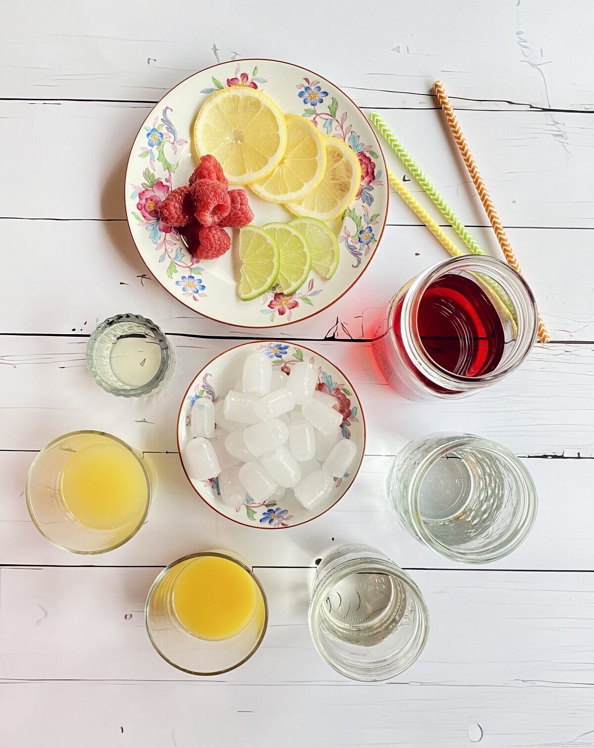 Ingredients to make pink bubbly punch mocktail.