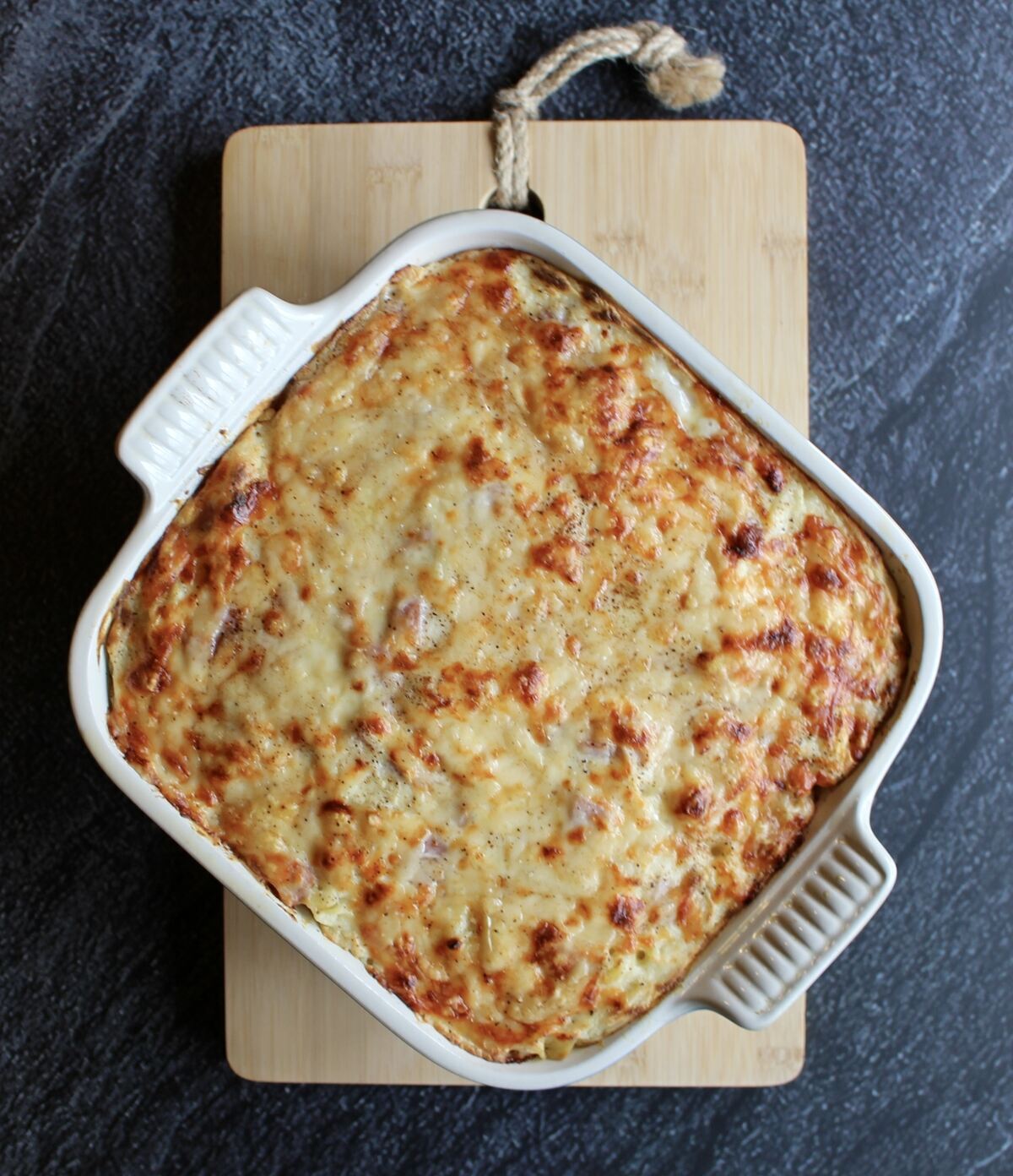 The top of the pasta bake after cooking so the cheese is brown and bubbly.