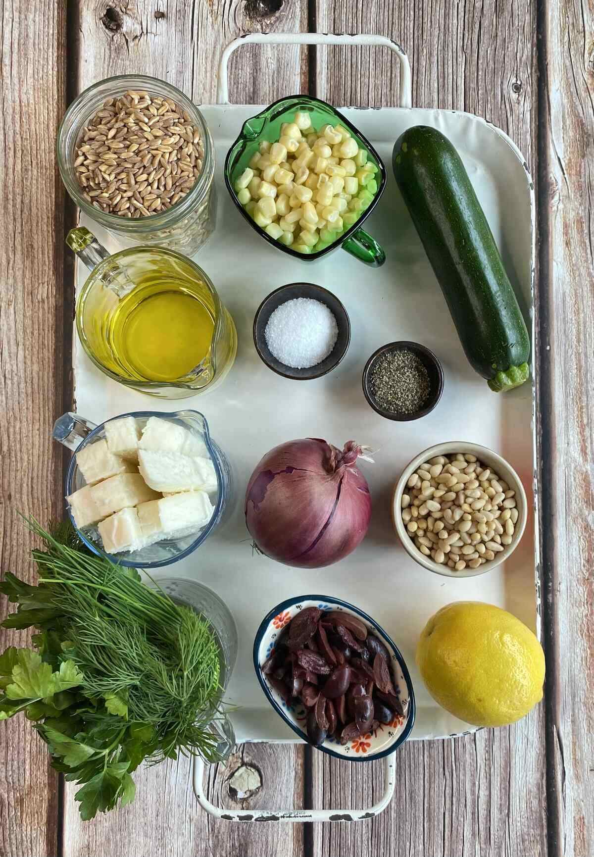 All the ingredients needed to make the farro salad.