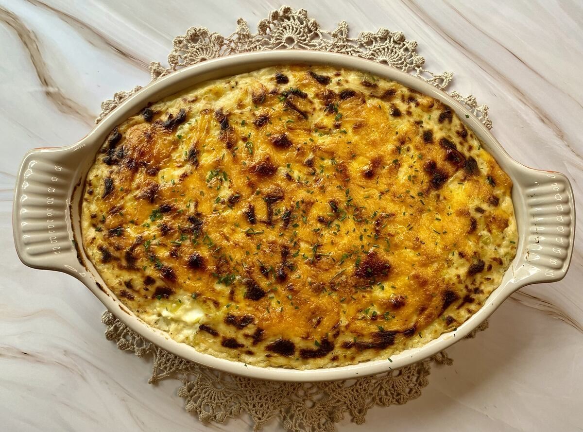 Dish of anglesey eggs baked and broiled.