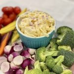 Jarlsberg cheese dip with a vegetable platter.