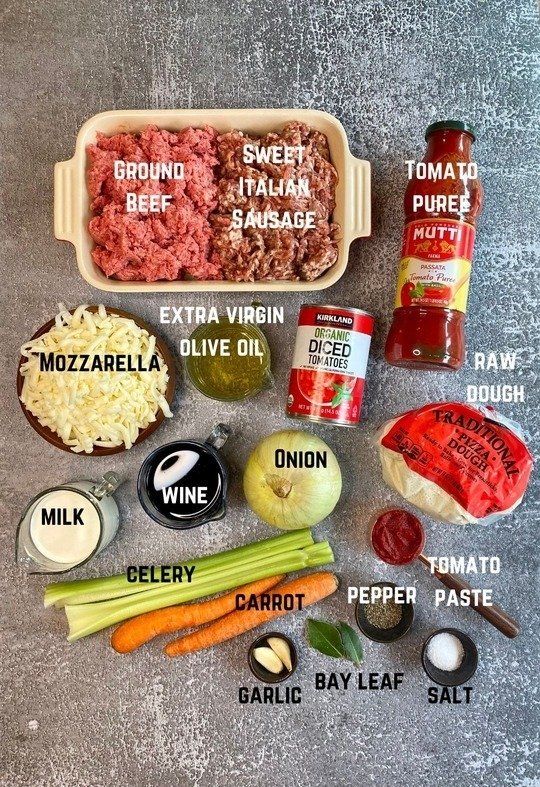 All the ingredients needed to make bolognese pizza.