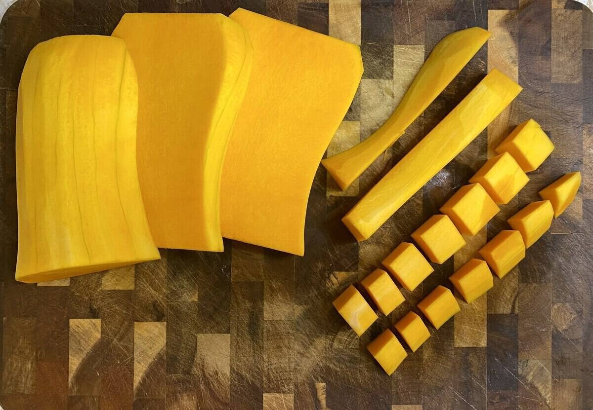 The shaft of the butternut squash sliced and diced into one inch cubes.