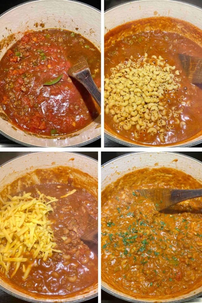 A dutch oven with pasta and cheese being added to the goulash.