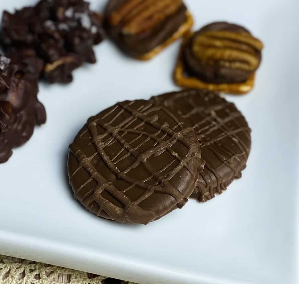 Ritz thin mints cookies on a white plate.