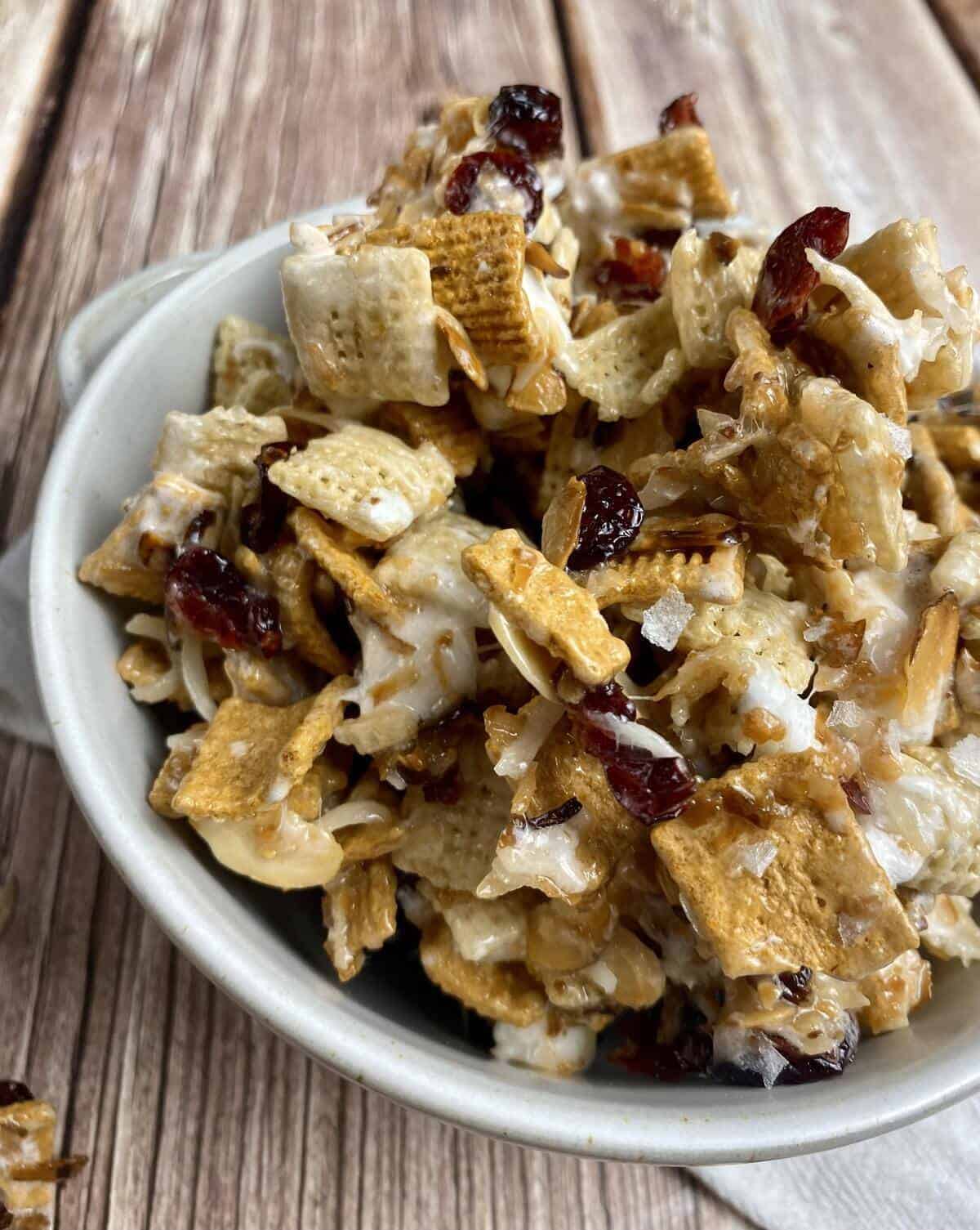 A closeup of the bowl of the crunch mix showing flakes of maldon salt.