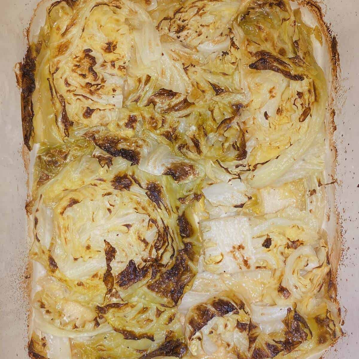 Cooked cabbage in a casserole dish.