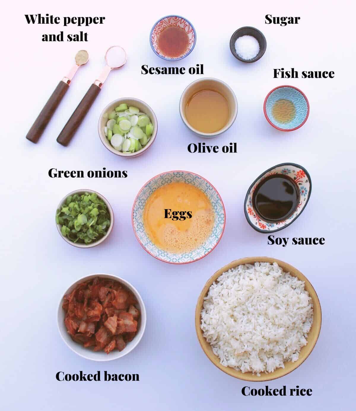 Many bowls filled with all the ingredients needed to make easy fried rice.