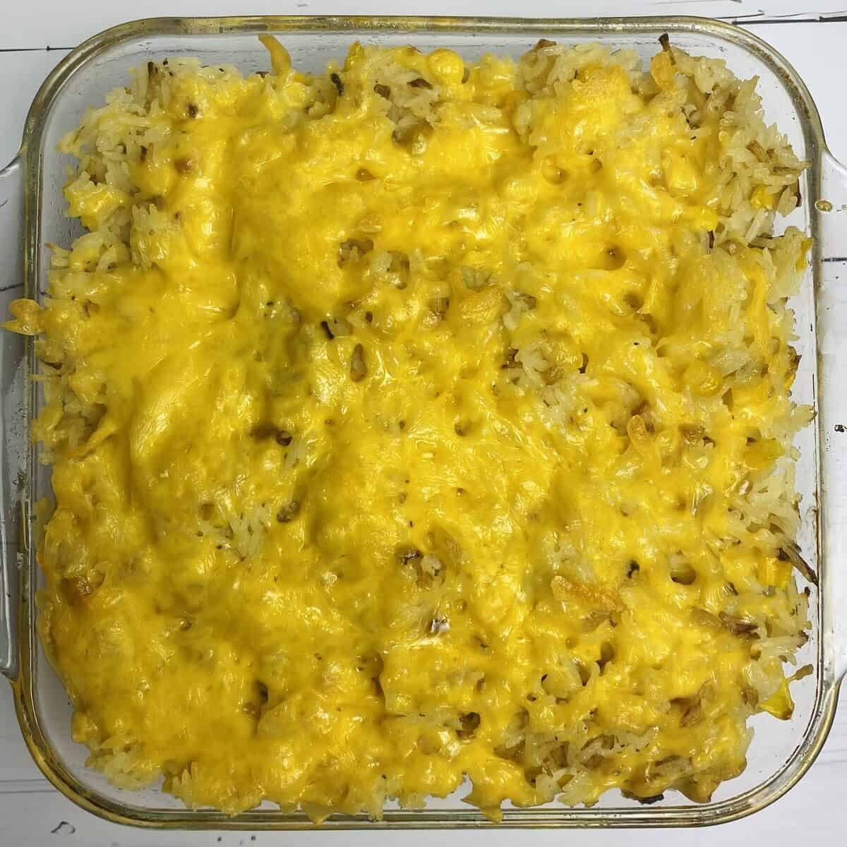 Sour cream rice in a baking dish after it has been cooked.