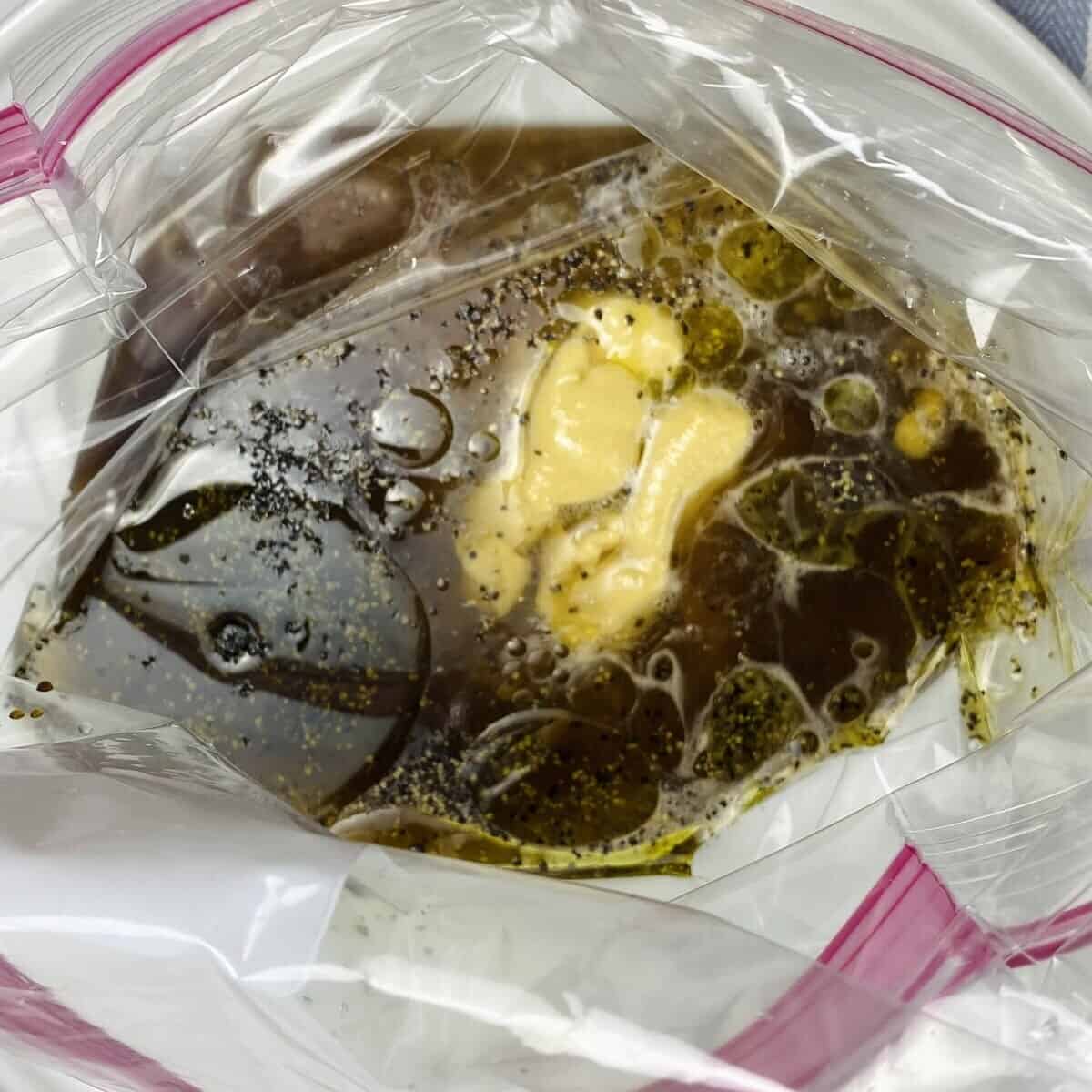 Marinade ingredients in a zip-top bag.