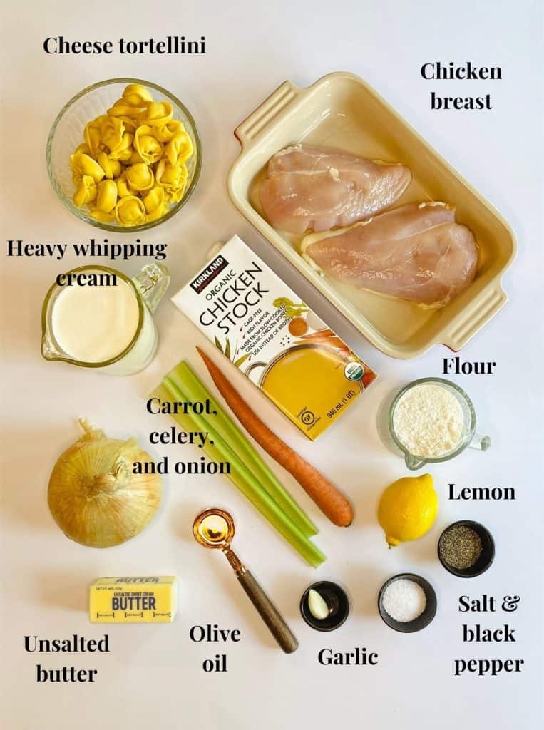 All the ingredients used to make chicken alfredo soup with tortellini.