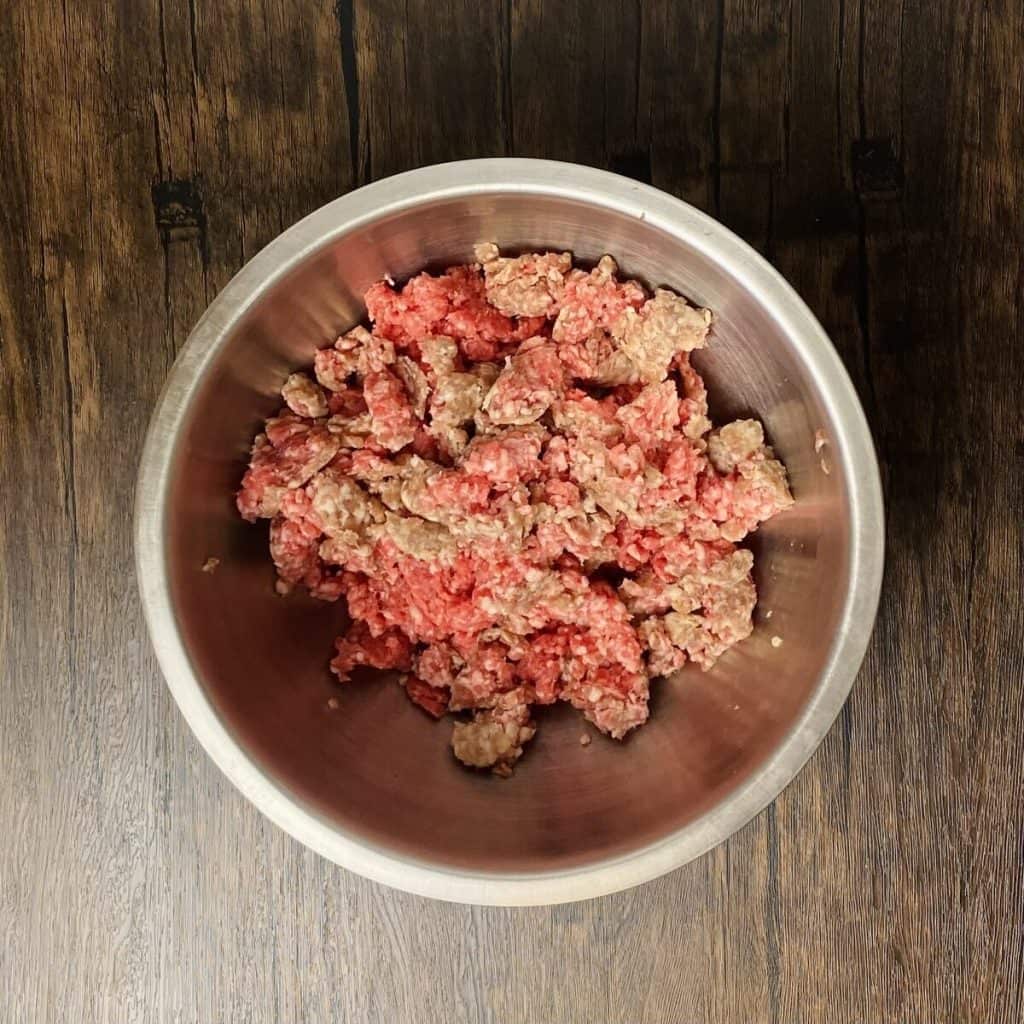 A bowl of crumbled ground meats.