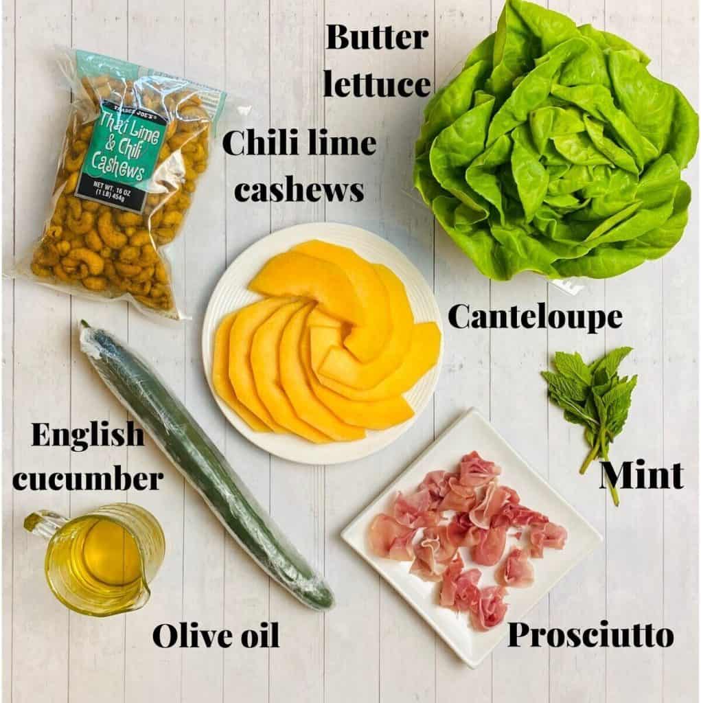 All the ingredients needed to make melon and prosciutto salad.