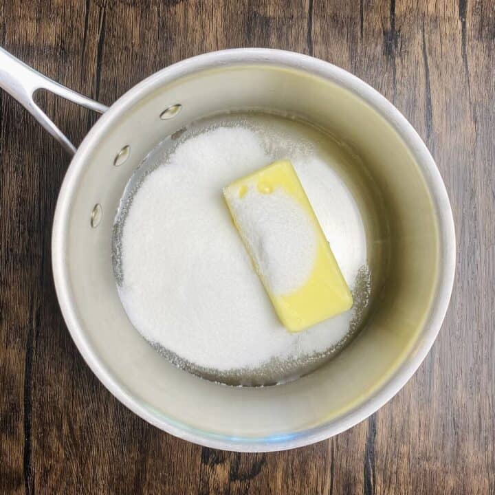 A soup pot with sugar and butter.