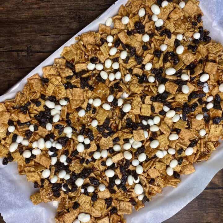 Cooling crunch mix with raisins added on top.