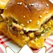 cheeseburger sliders on a red checkered plate.