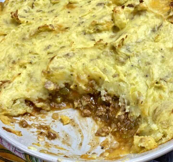 A closeup of the toasted mashed potatoes of a shepherd's pie.