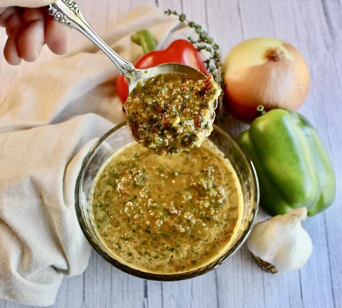 Spoonful of epis sauce.