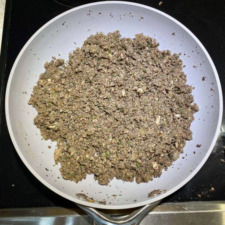 Cooked duxelles ingredients in a non-stick pan.